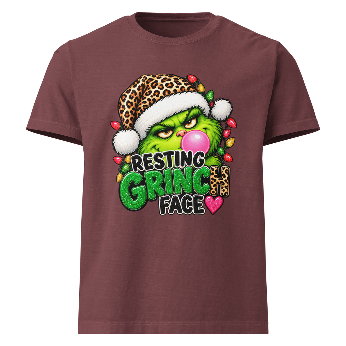 Resting Grinch Face Christmas graphic T-shirt in washed maroon, front view.